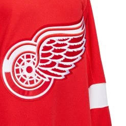 DETROIT RED WINGS ADIDAS ADIZERO PRIMEGREEN AUTHENTIC RED HOME JERSEY -Professional Hockey Equipment Store DETROIT RED WINGS ADIDAS ADIZERO PRIMEGREEN AUTHENTIC RED HOME JERSEY LOGO CREST