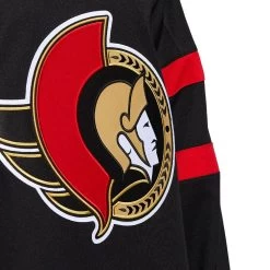 BRADY TKACHUK OTTAWA SENATORS ADIDAS ADIZERO PRIMEGREEN AUTHENTIC BLACK HOME JERSEY -Professional Hockey Equipment Store OTTAWA SENATORS ADIDAS ADIZERO PRIMEGREEN AUTHENTIC BLACK HOME JERSEY logo crest 1024x1024 7f020c9f 349d 4360 86ef d79554aaea2f